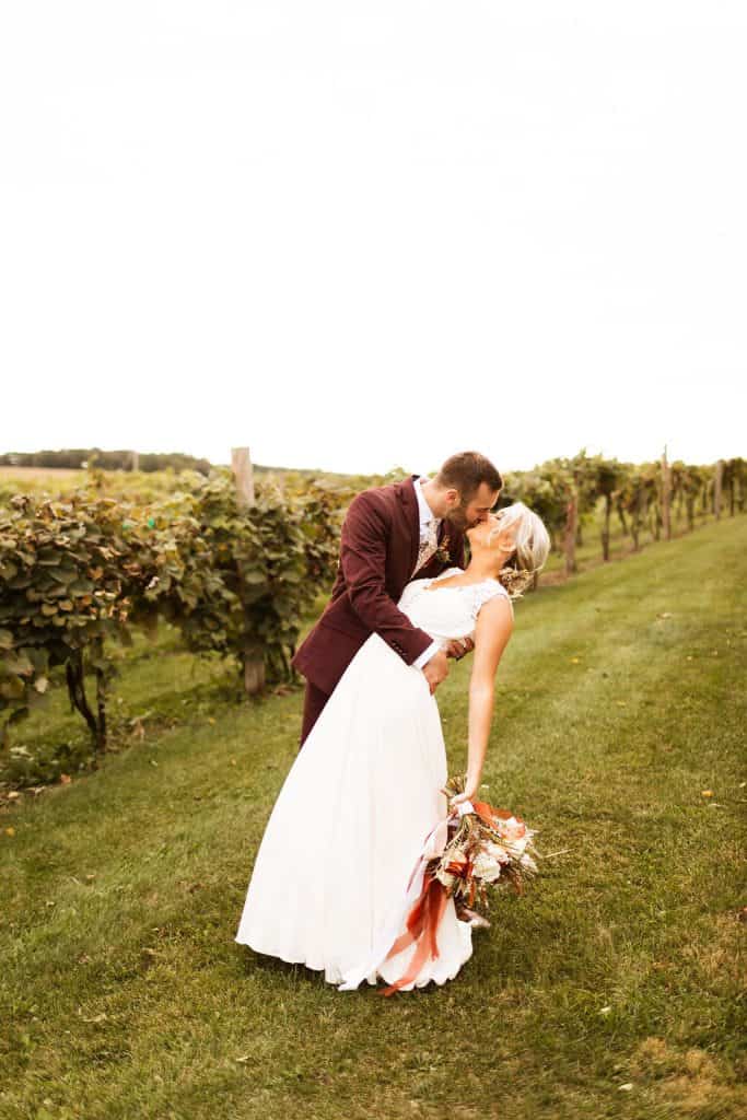 vineyard-couple-dip-pose-brett-courtney-blue-dorr-photography